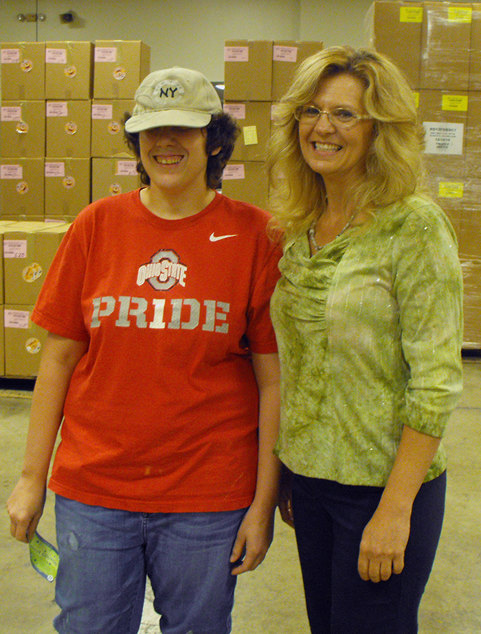 Rashawana and Individual in the Marimor Industries warehouse